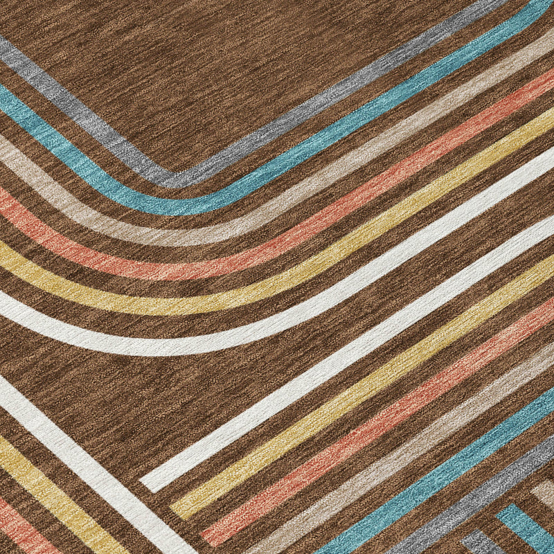 Geometric stripe wave area rug in dark brown with ivory, teal, coral, and gold tones