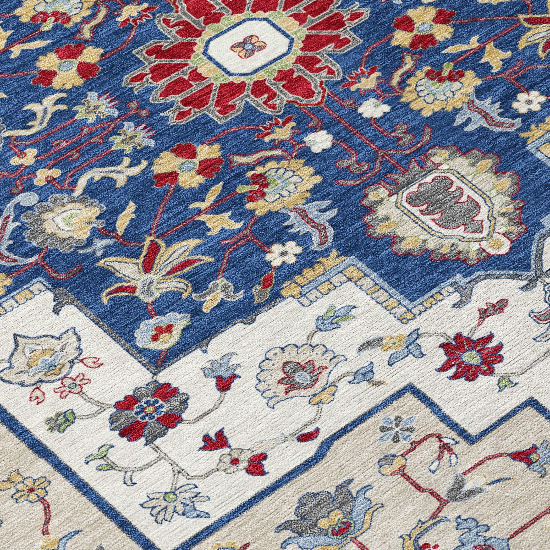 Navy blue and cream area rug with floral patterns, intricate red and gold detailing, traditional Persian style.