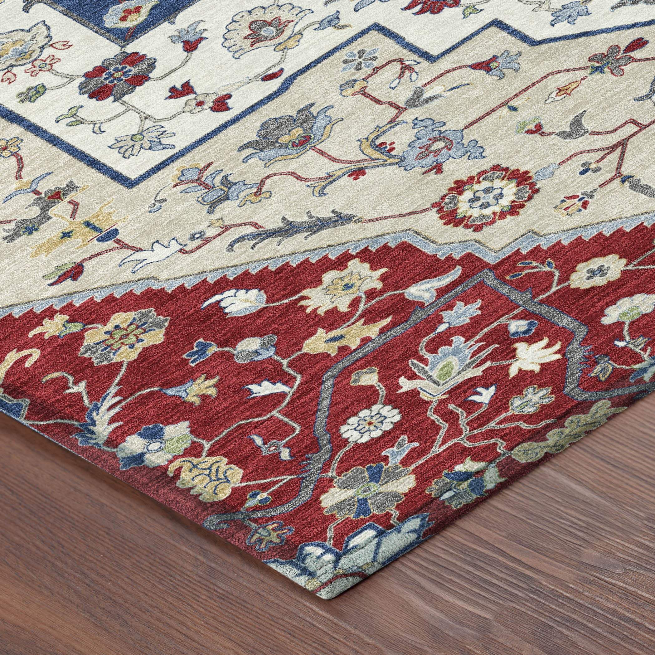 Handcrafted cream, blue, and red area rug with floral patterns; soft wool material, traditional style.