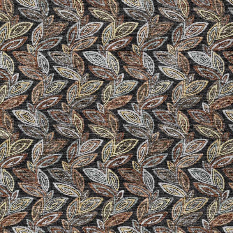 Patterned area rug with scattered botanical leaves in gray, black, and warm orange