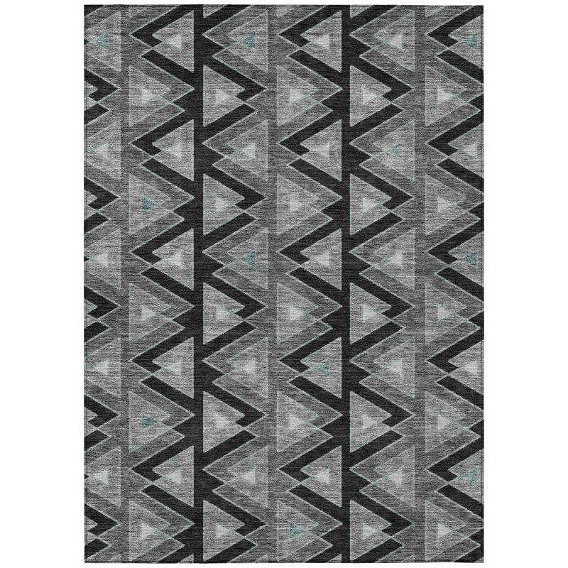 Rectangular gray and black geometric area rug with repeating arrow triangle motif.