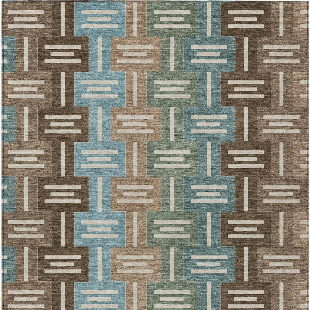 Multicolor geometric area rug in shades of blue, brown, and cream, soft textured material, modern style.