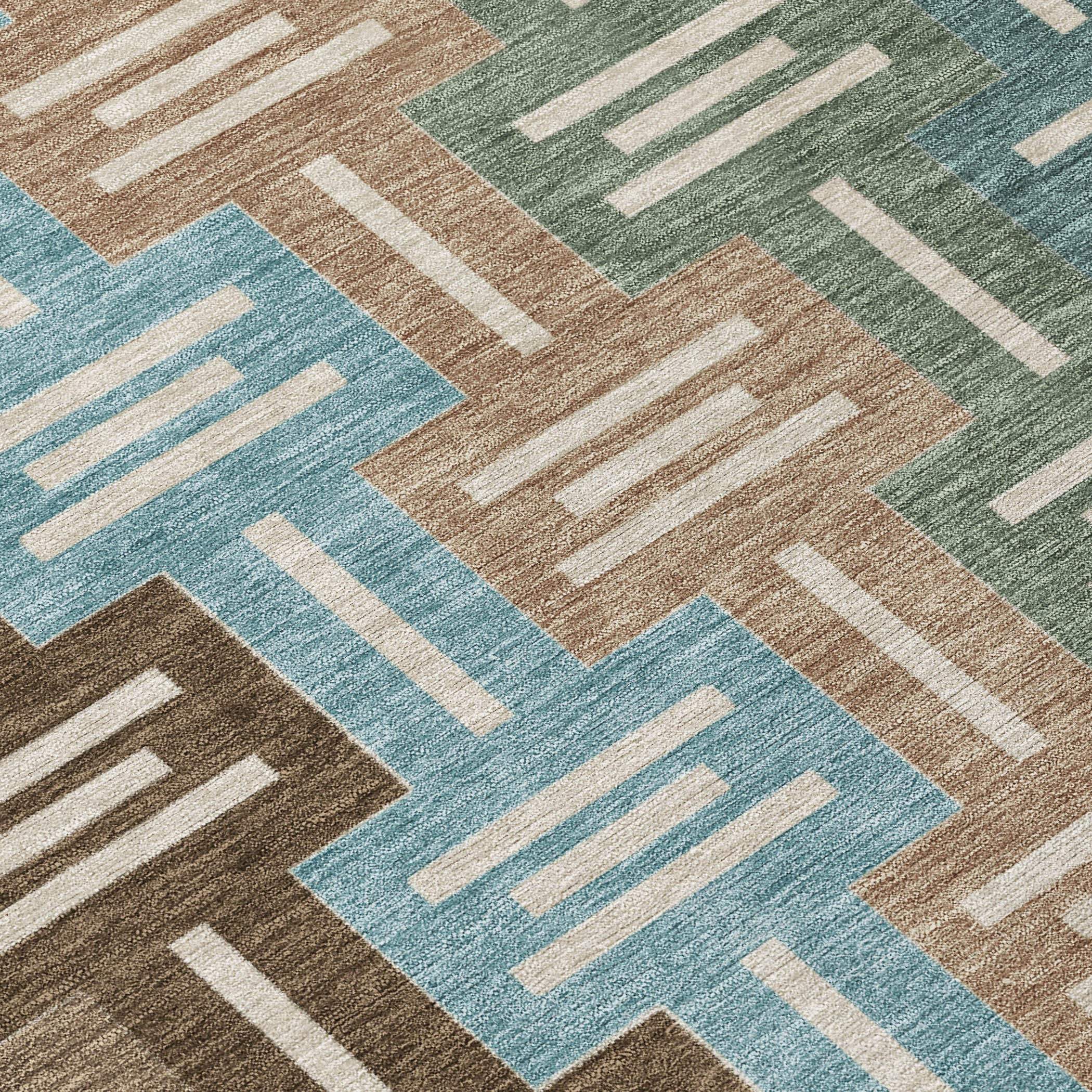 Geometric area rug in teal, brown, and cream, featuring a contemporary design with overlapping squares and lines.