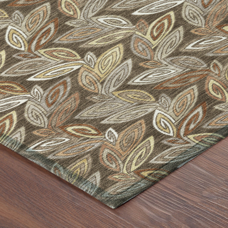Botanical leaf area rug corner with textured pile and brown-rust motifs on taupe