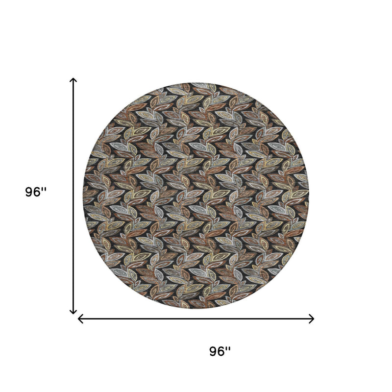 Round botanical leaf pattern rug, 96 in diameter; charcoal, gray, tan, gold