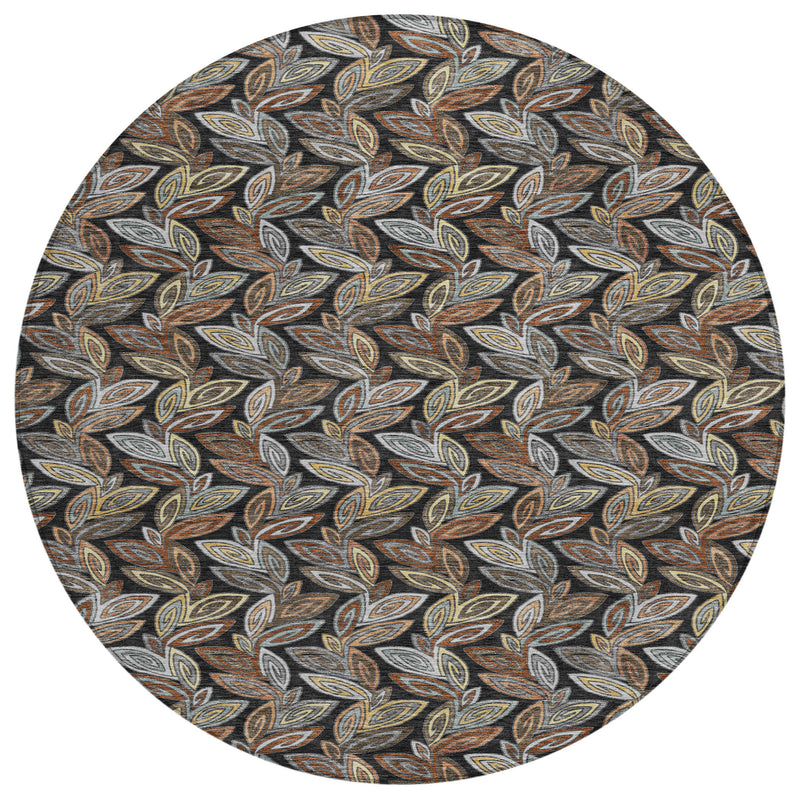 Round botanical leaf patterned rug, charcoal and gray with tan and gold leaf outlines