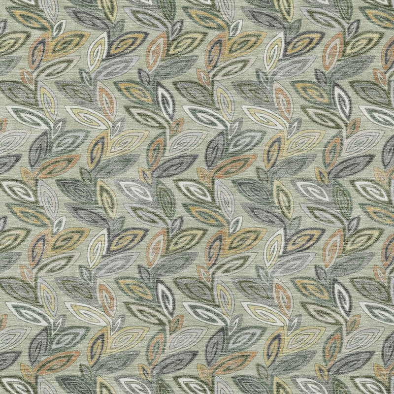 Botanical leaf rug close-up, textured gray weave with green, yellow, and orange leaves
