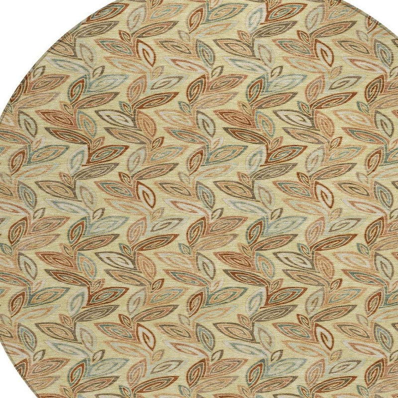Round area rug fabric texture with botanical leaf motif in wheat and teal accents