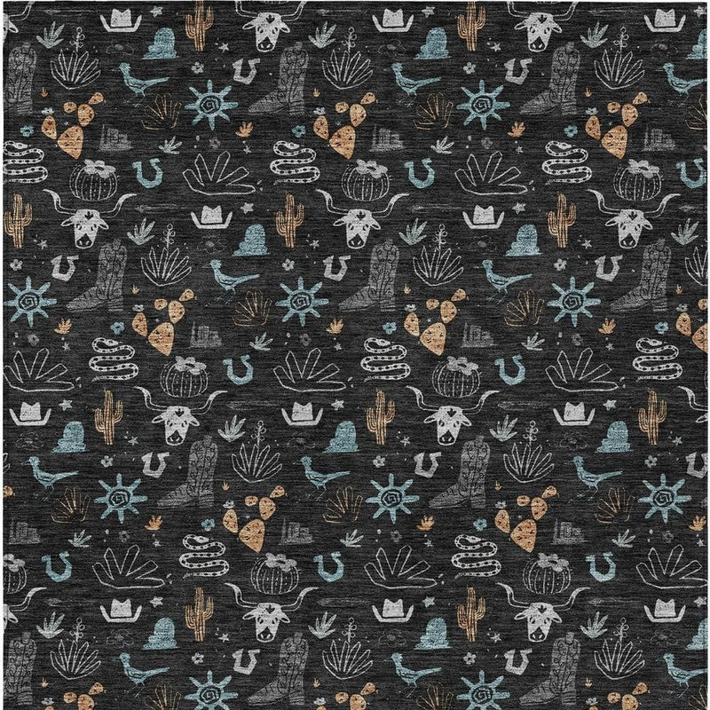 Black area rug with repeating teal cactus, white, and tan desert icons pattern