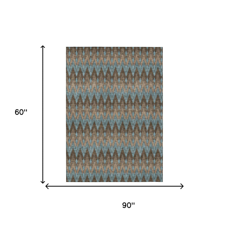 Blue and brown geometric area rug shown with 90" x 60" size guide