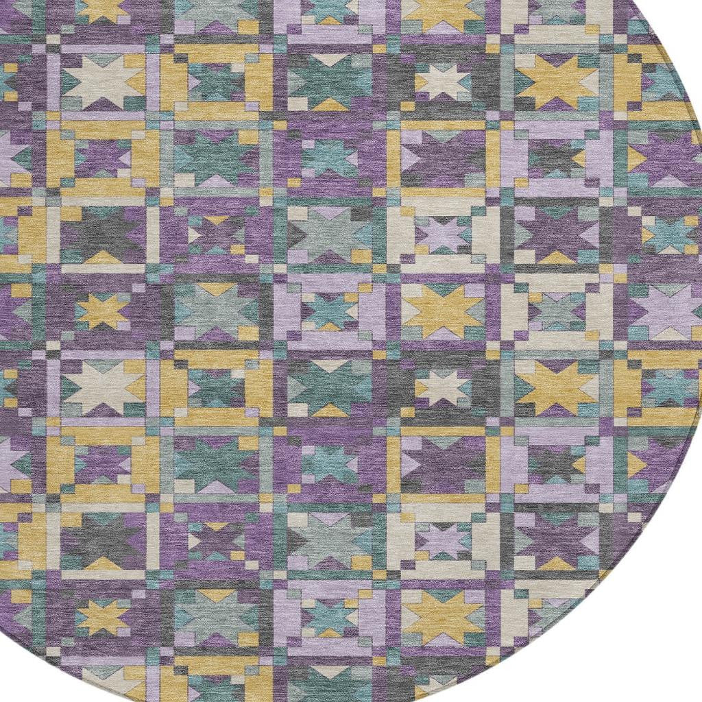 Round area rug featuring a multicolored geometric pattern in purple, yellow, and teal, made of soft, durable fabric.