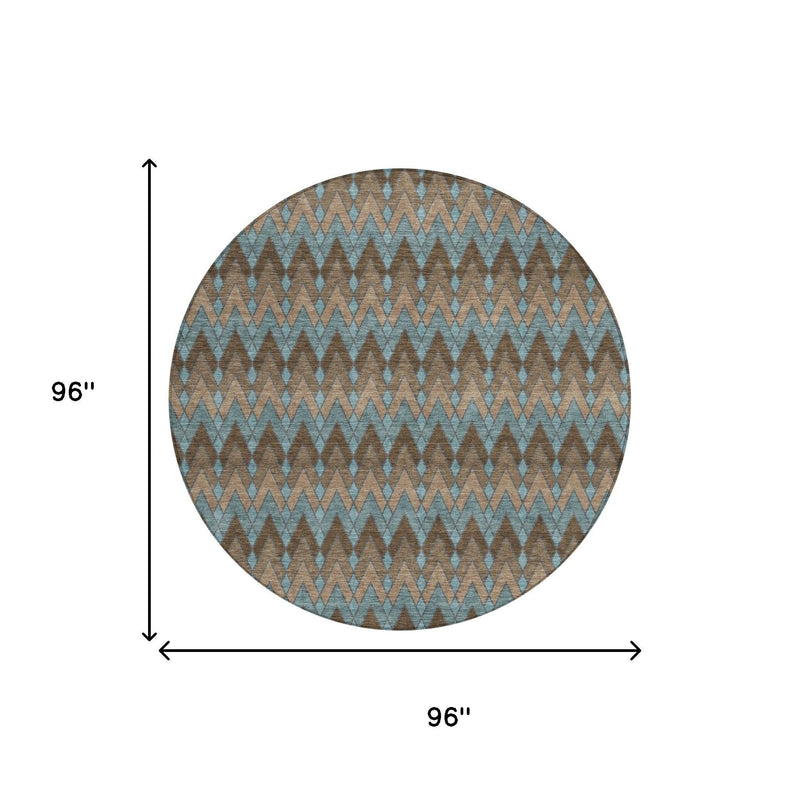 Round rug with teal and brown chevron pattern, 96 in diameter
