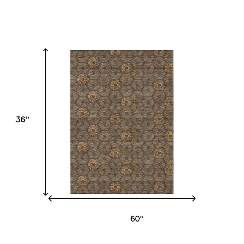 Geometric gray and brown area rug, 36 in x 60 in