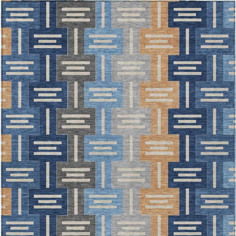 Navy and blue geometric area rug with vertical bars in tan and gray
