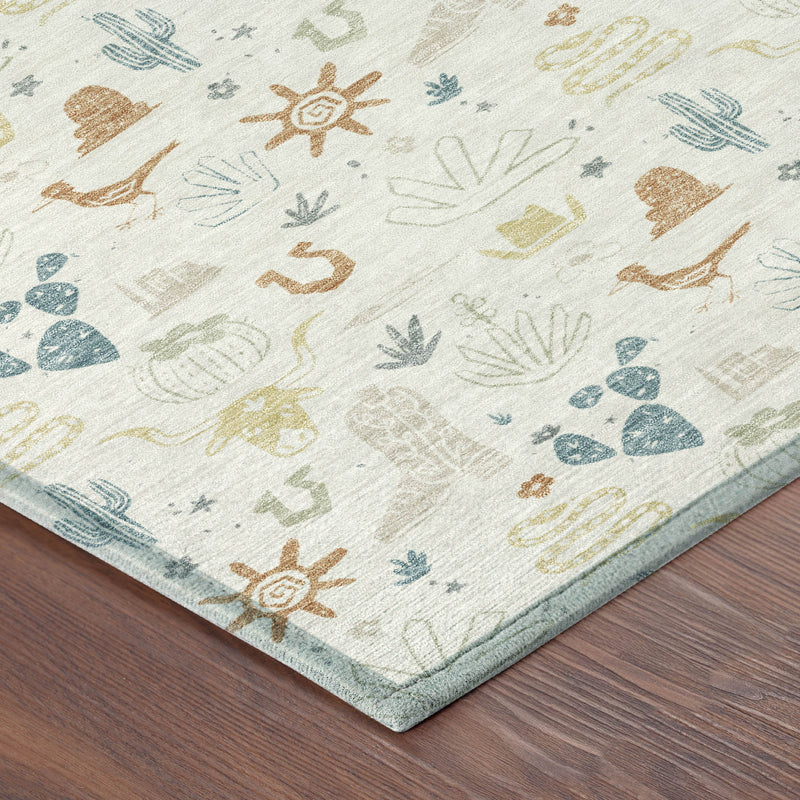 Corner view of ivory area rug with multicolor cactus, sun, and plant motifs on flat weave
