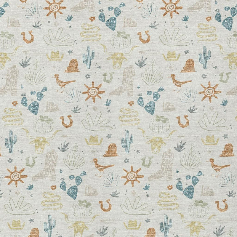 Close-up ivory rug with repeating cactus, cactus pads, and sun icons in blue and tan