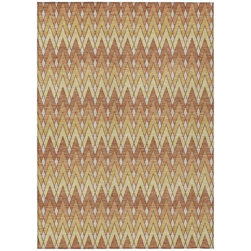 Orange and copper geometric chevron area rug with cream zigzag pattern.