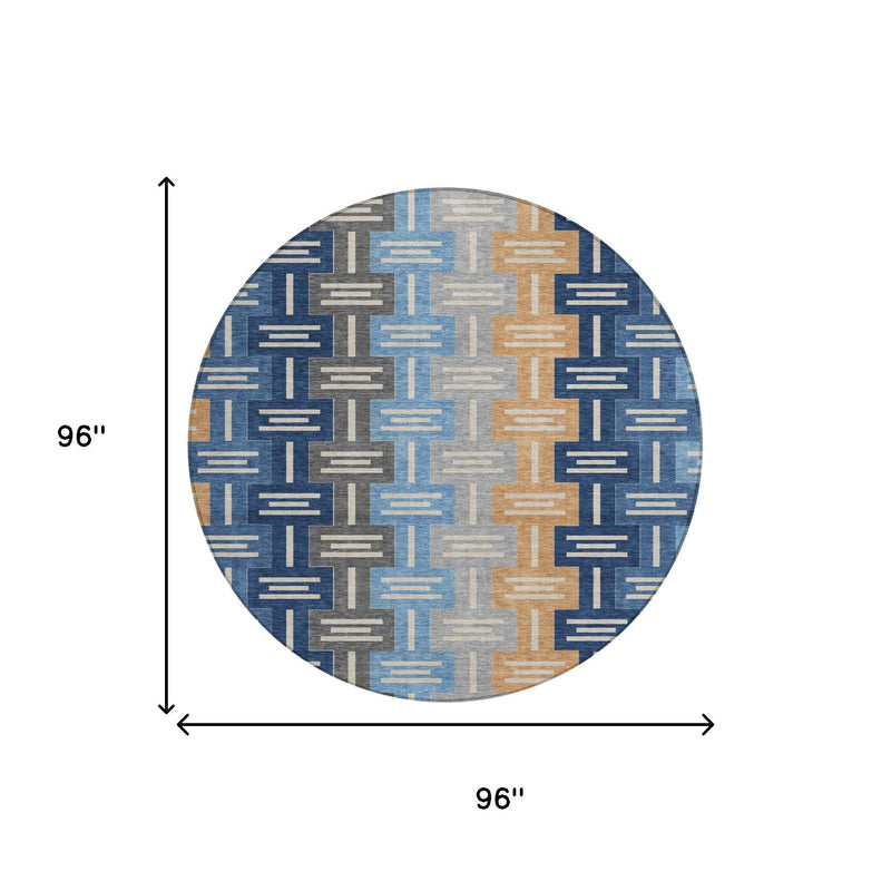 Round washable area rug, geometric maze-like pattern in blue, tan, and gray; 96 in.