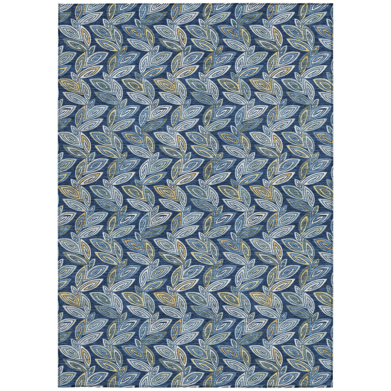 Navy blue indoor outdoor rug with repeating leaf motif in light blue and olive tones