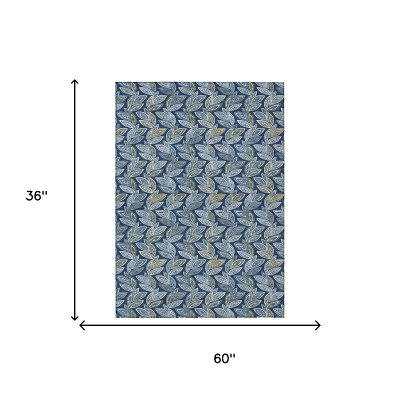 Rug size 60 x 36 in, navy blue with repeating leaf pattern in light blue and gold