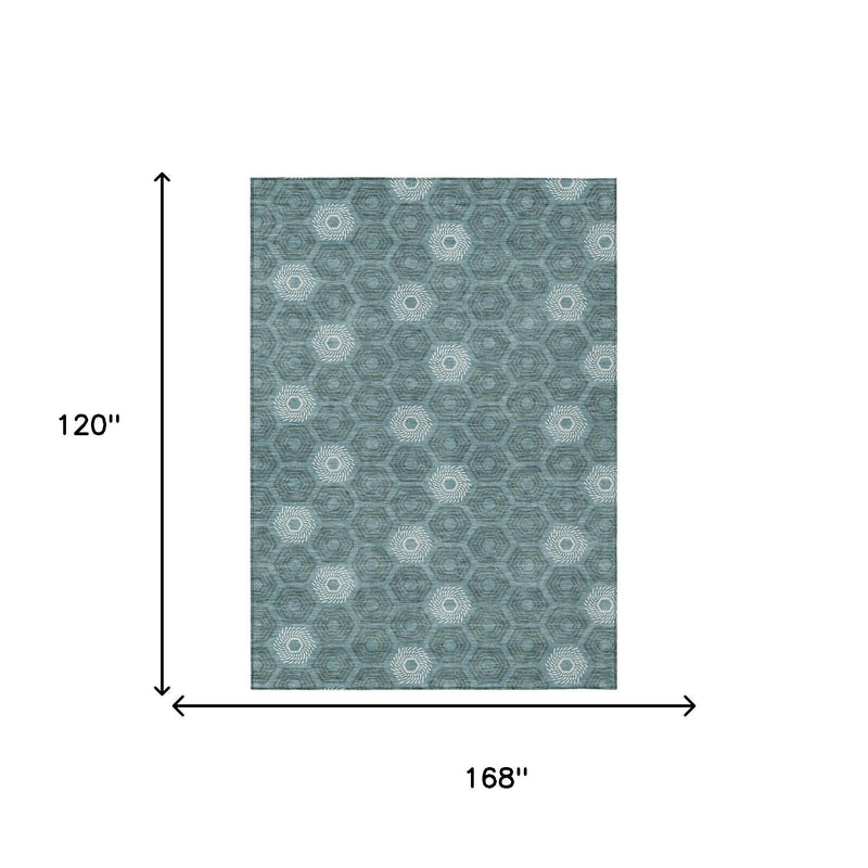 Teal blue geometric rug, 168 in by 120 in, with ivory medallion motif