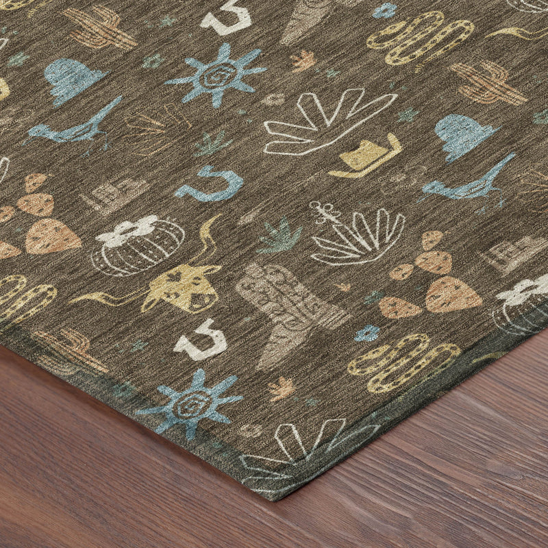Corner close-up of brown area rug with teal, blue, white, and tan cactus icons