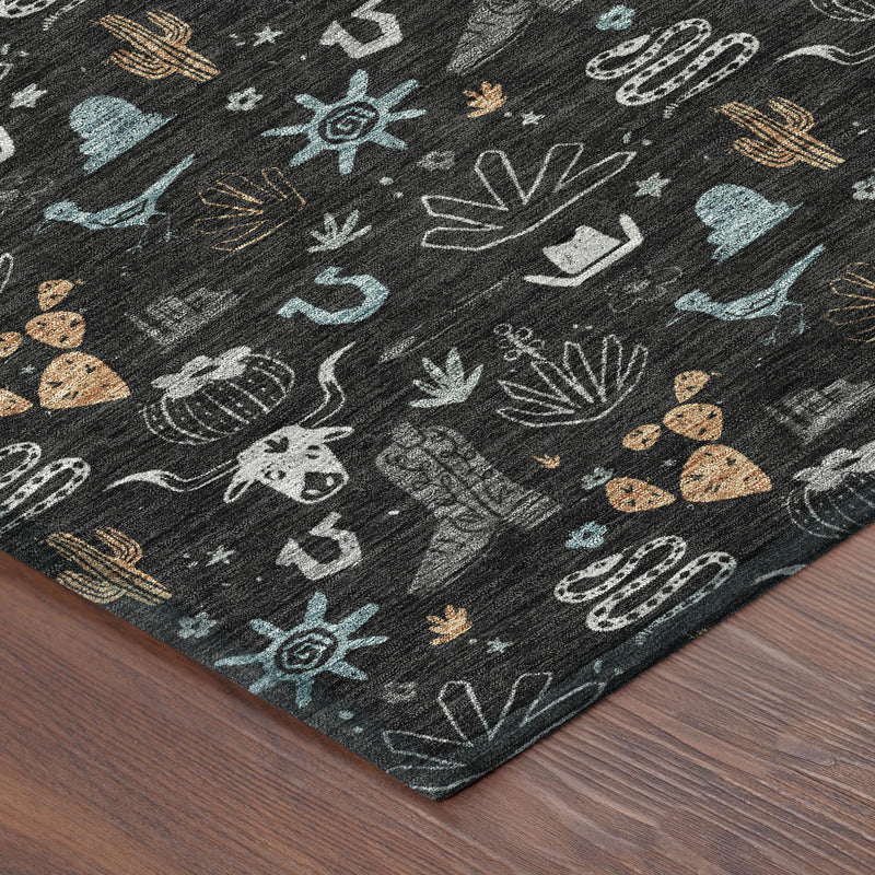 Corner of black area rug with teal cactus and desert doodles, flat woven look