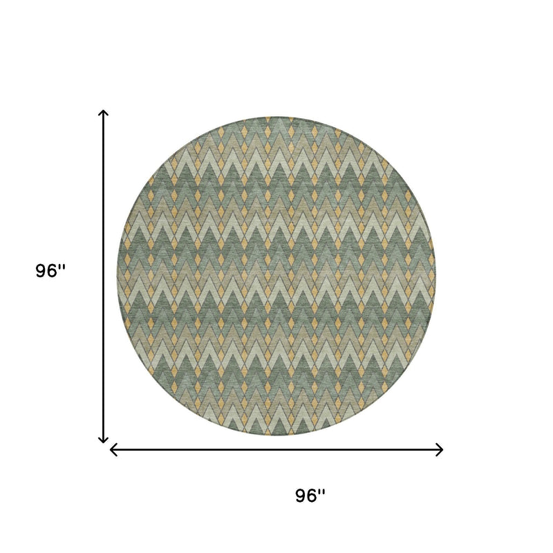 Round geometric area rug, 96 in diameter, green base with gold and tan zigzags