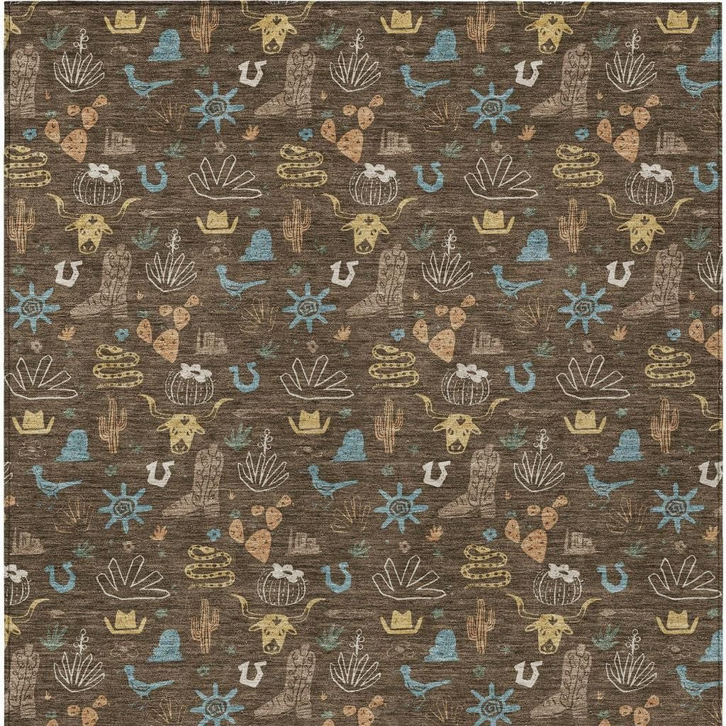Brown indoor outdoor area rug with repeating desert icons, including cactus, in teal and tan