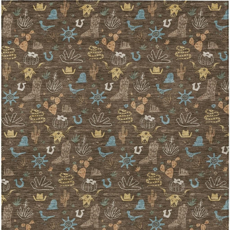 Brown indoor outdoor area rug with repeating desert icons, including cactus, in teal and tan