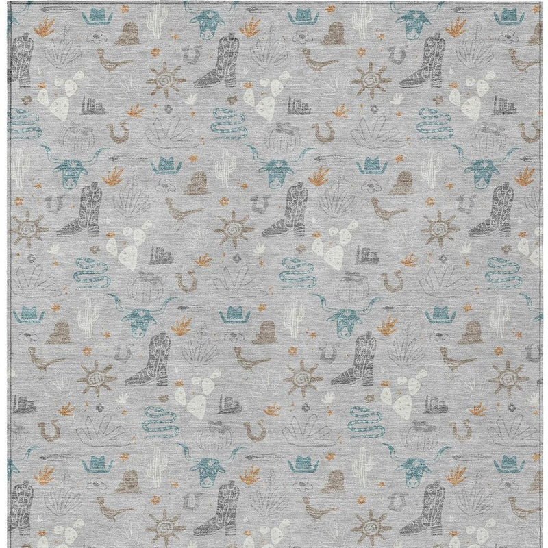 Pattern view of light gray area rug with teal blue and tan desert/cactus icons