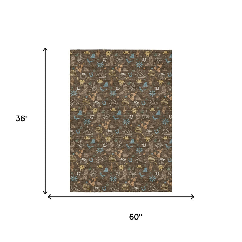 Rectangle area rug, dark brown with repeating desert icon pattern in teal and tan; 60x36 in.