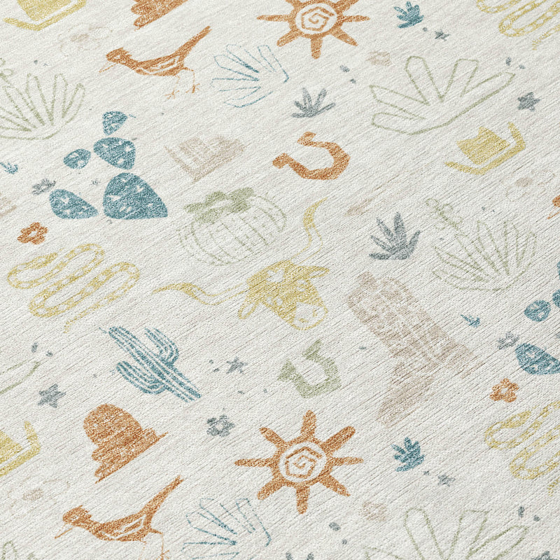 Round area rug close-up with cactus, sun, and desert animal pattern on ivory ground