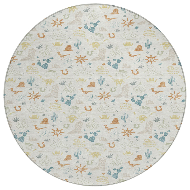Round area rug full view showing multicolor desert pattern on light ivory base