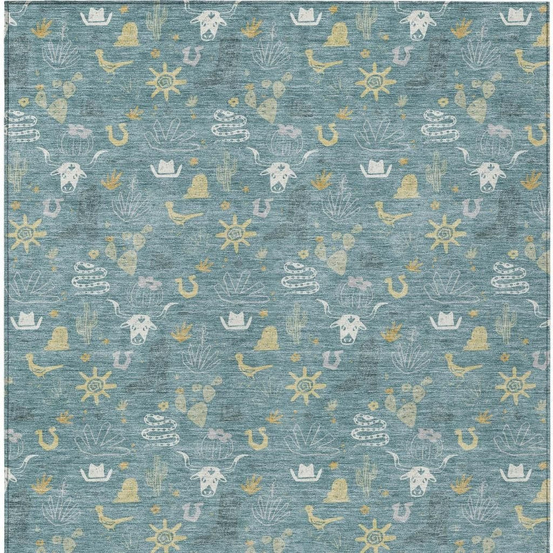 Teal blue area rug with cactus wash-style repeat pattern in white and wheat tones
