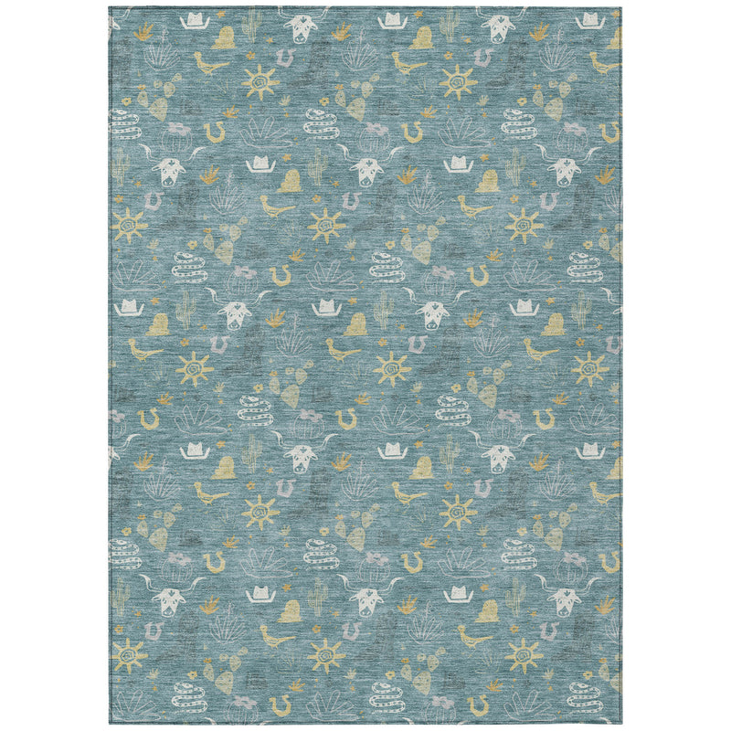 Teal blue area rug with overall cactus wash pattern in white and wheat tones