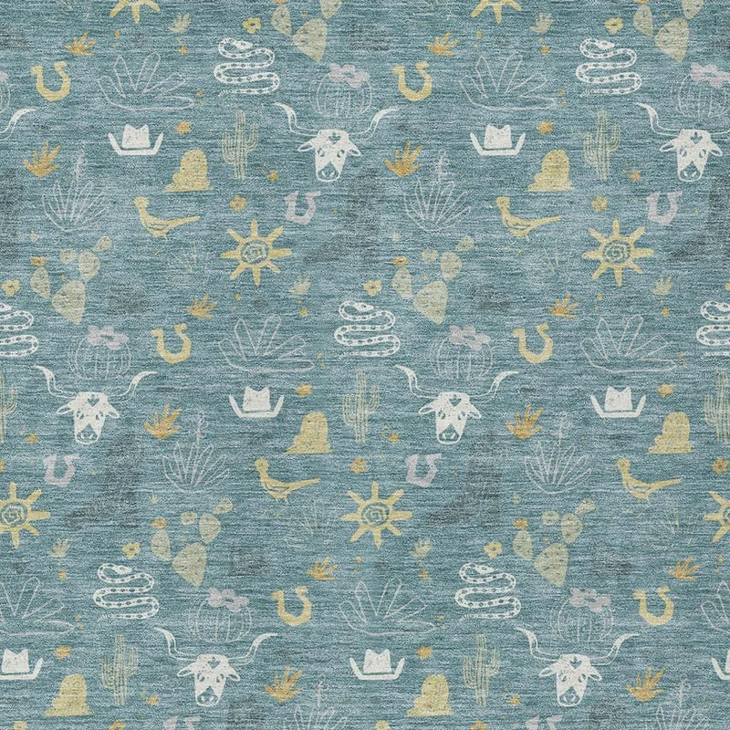Teal blue area rug close-up with white, yellow, and wheat desert icon pattern