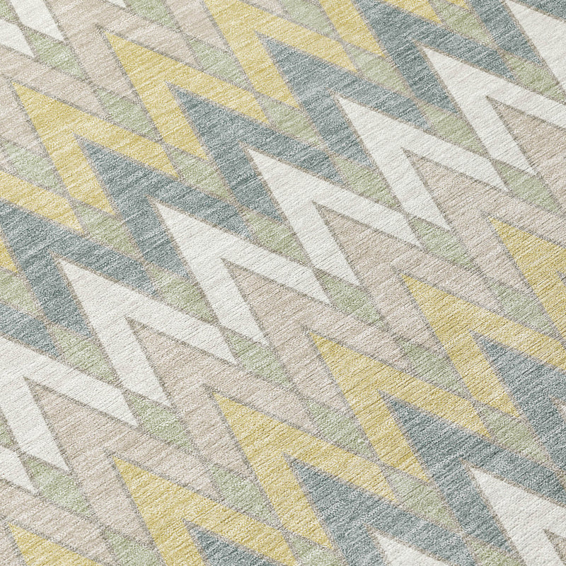 Ivory area rug with diagonal chevron stripes in blue, yellow, green, and white