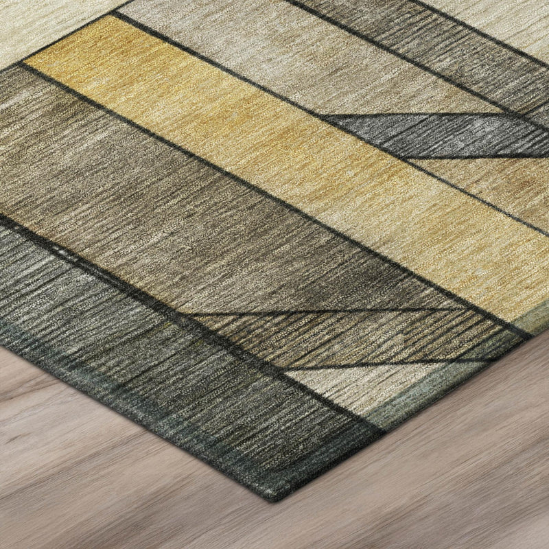 Round geometric rug detail showing tan and gray stripes and textured blocks