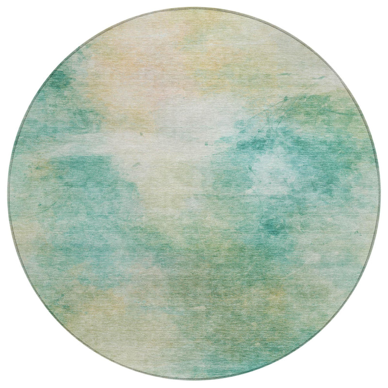 Round abstract area rug in aqua and teal with cream highlights and tonal border