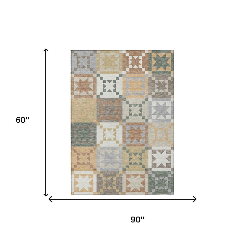 Patchwork area rug with geometric star pattern; 90 in by 60 in dimensions