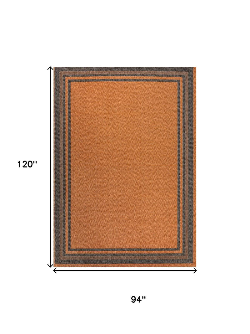 8x10 ft indoor outdoor area rug with dark gray striped square border on orange field