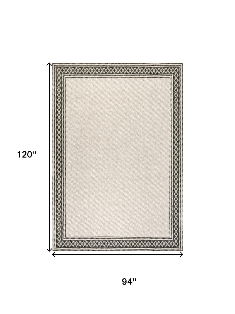 Indoor outdoor area rug size diagram: 94 in by 120 in, cream with black border