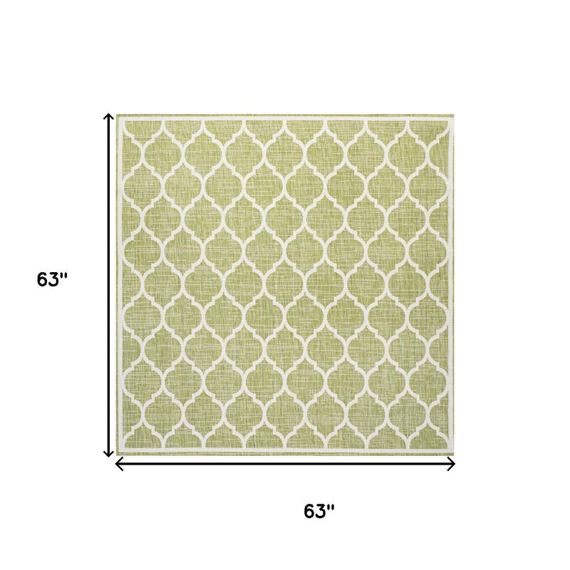 Green and cream square area rug, 63 in x 63 in, quatrefoil geometric pattern.