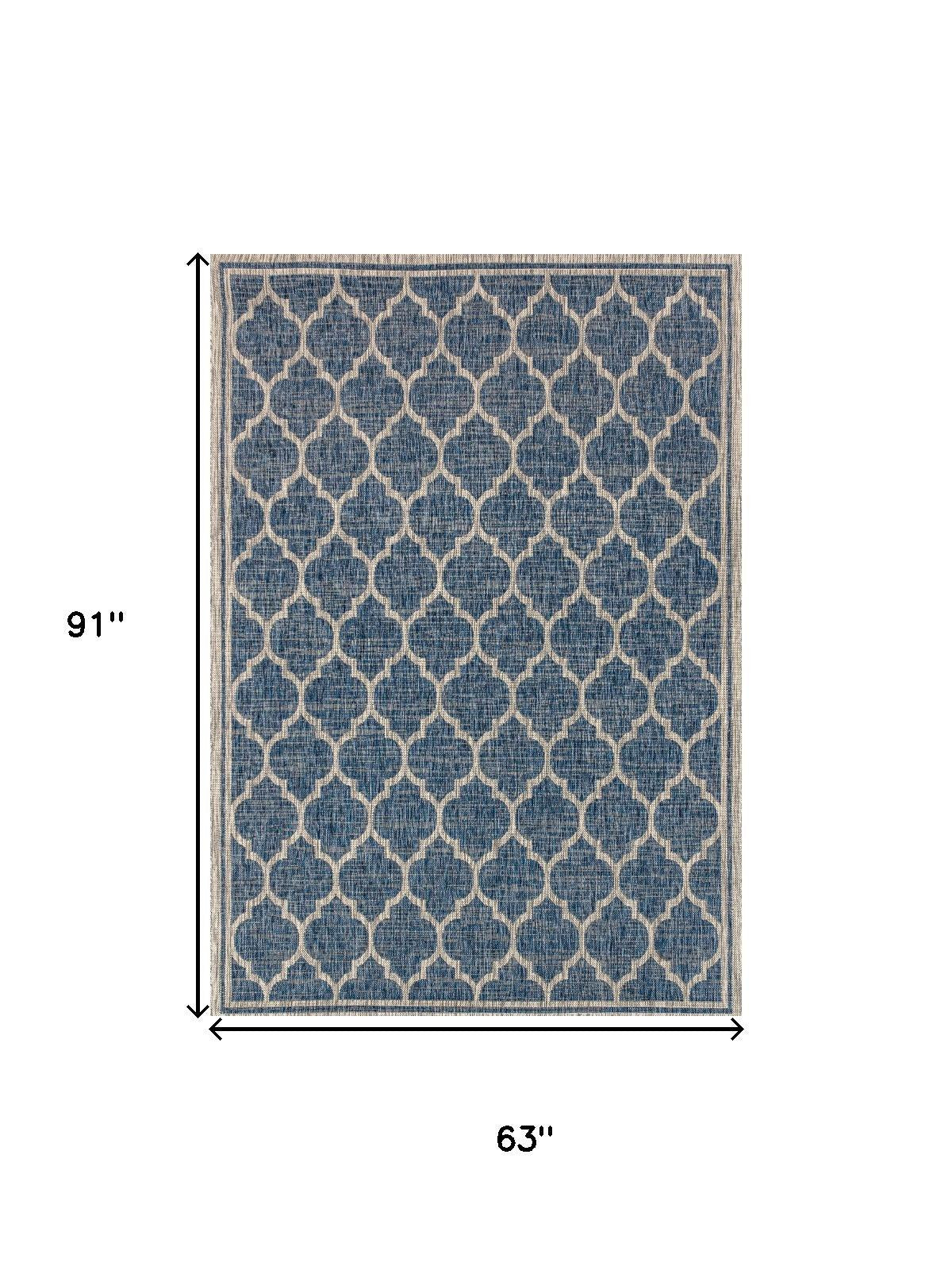 5x8 area rug with navy and gray geometric trellis pattern, indoor/outdoor style.