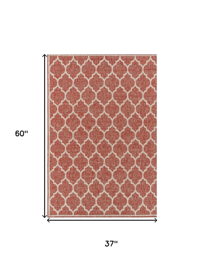 Red and beige trellis geometric area rug, 37 in by 60 in