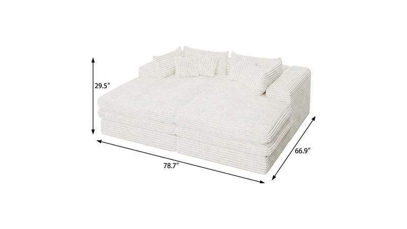 White corduroy chaise lounge with four toss pillows, side view