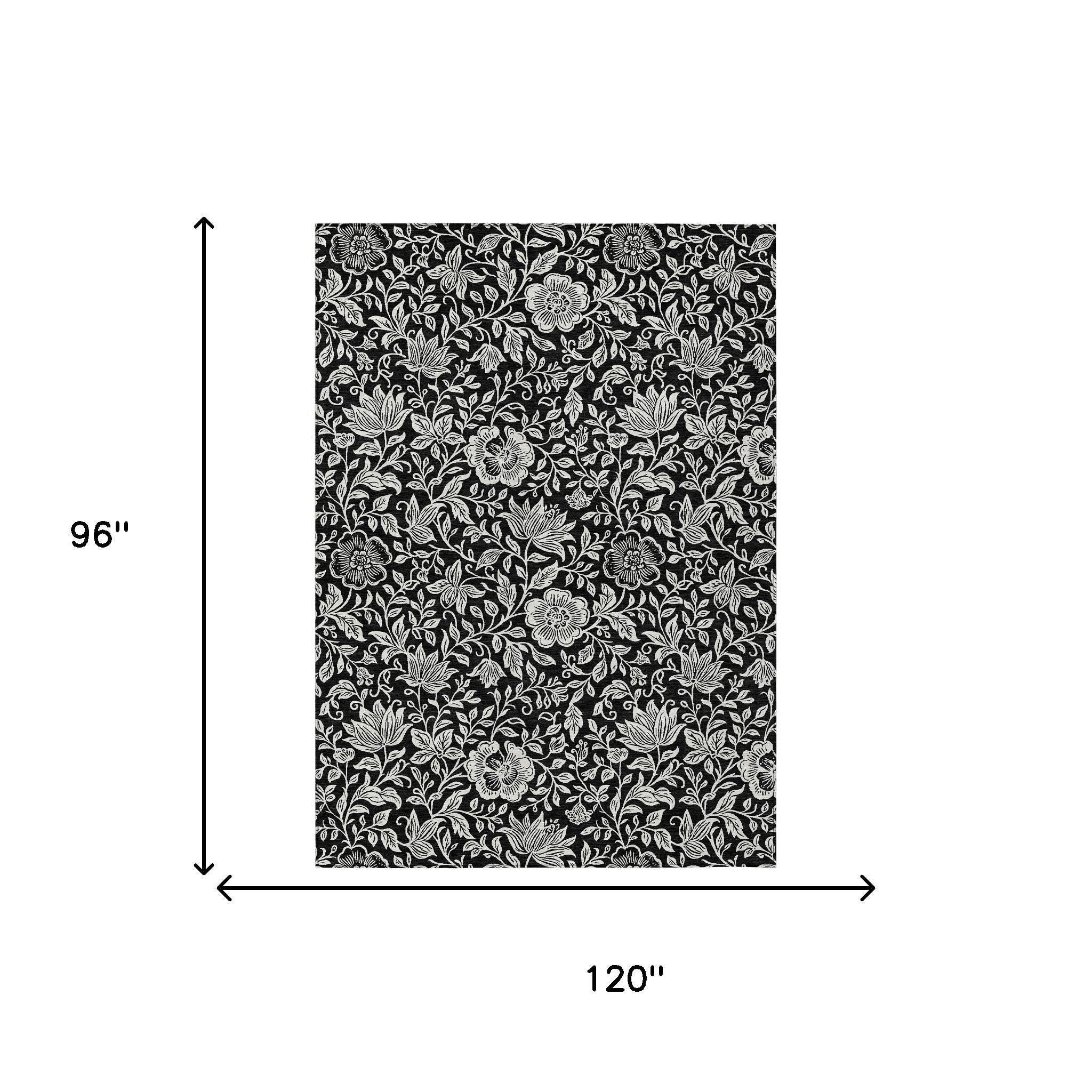 8 x 10 ft black and ivory floral area rug with dense leaf-and-bloom pattern