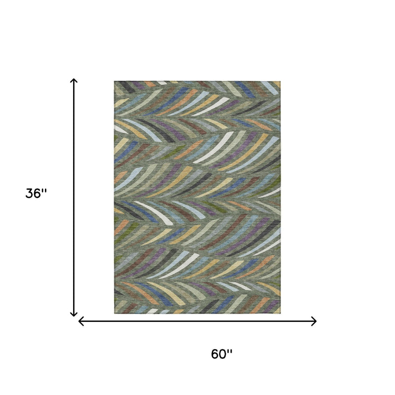 Rectangular abstract area rug, 60 in by 36 in, multicolor wave stripes on gray-green
