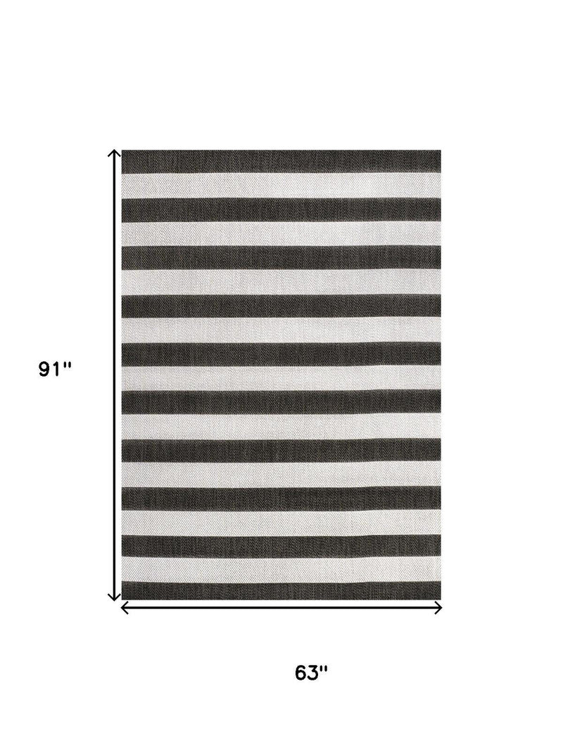 Striped area rug with horizontal bands; shown dimensions 63 in x 91 in
